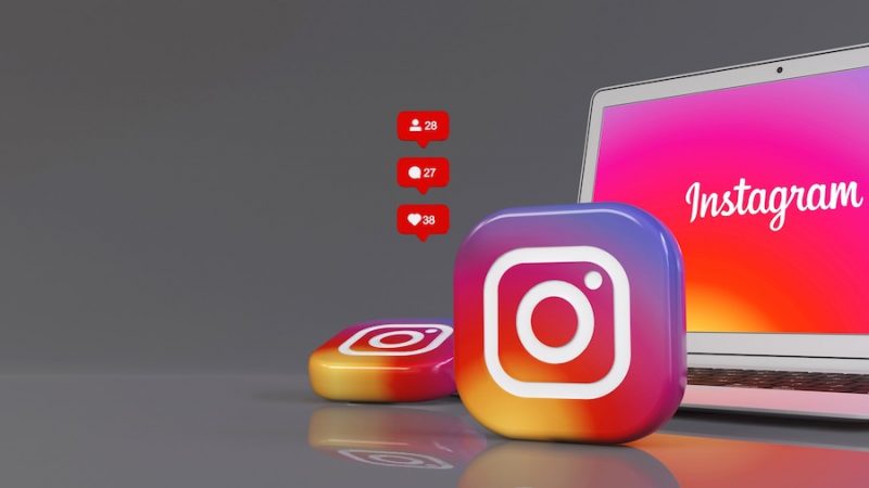 3d-rendering-two-instagram-badges-front-notebook-with-app-logo-screen_284880-246